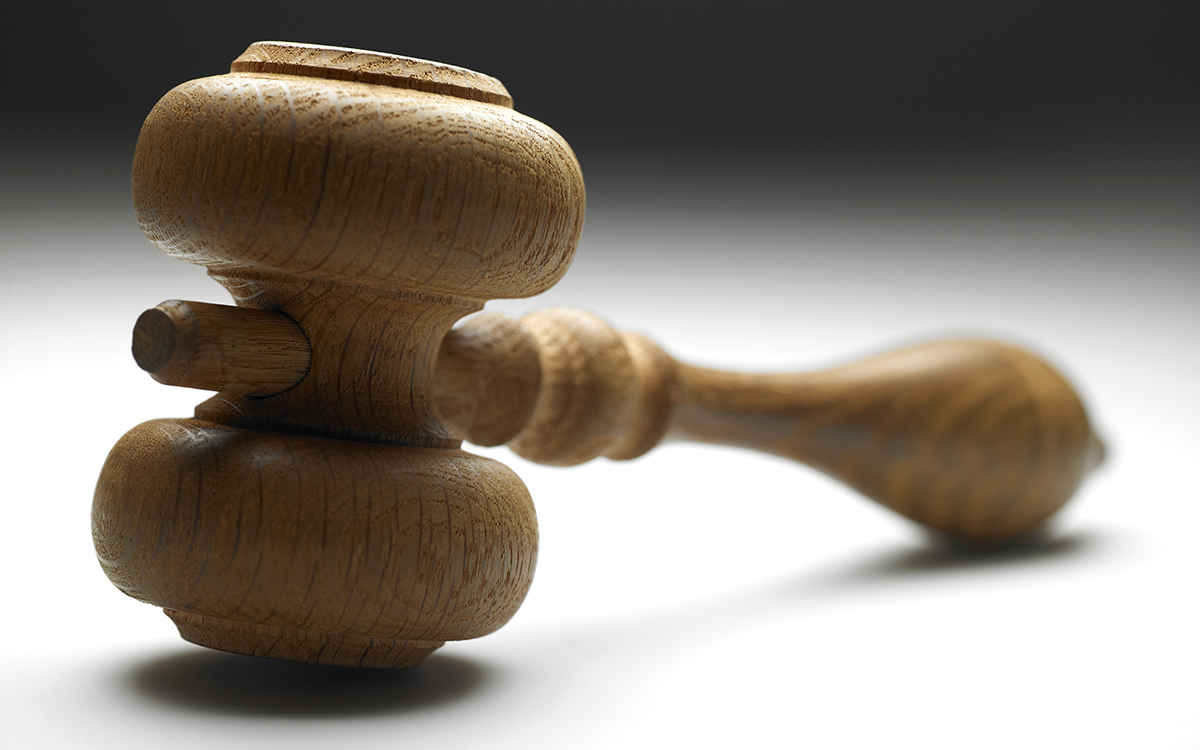 Brun träklubba för årsmöten